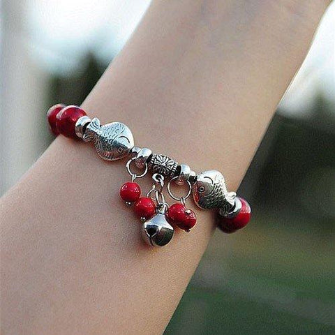 Tibetan silver fish and bell with red coral bracelet